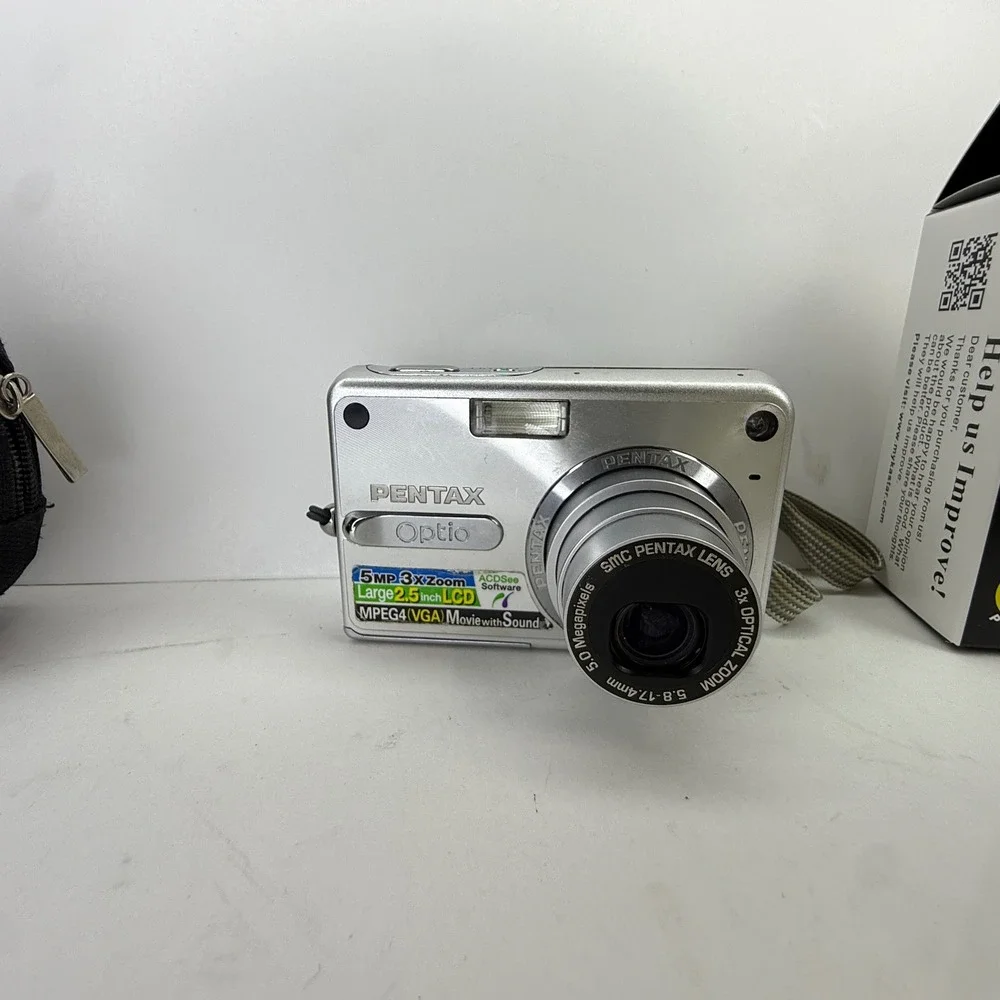 Pentax Optio S5z Silver Digital Camera 5.0MP 3x Zoom Bundle with Charger Case